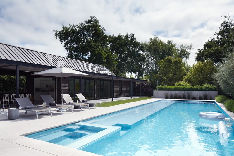 Swimming pool with modern pavilion