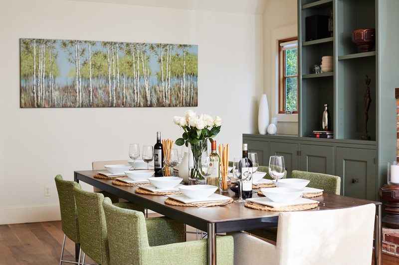 Dining room with birch tree painting
