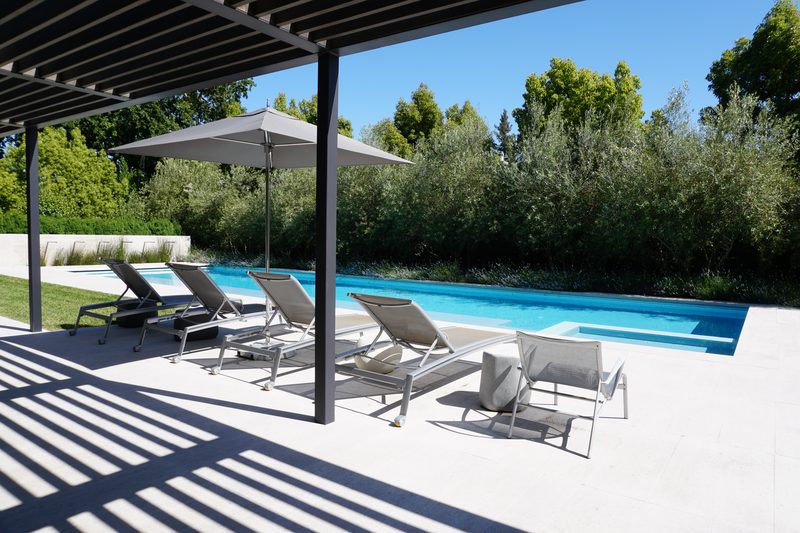 Pool from shaded pergola